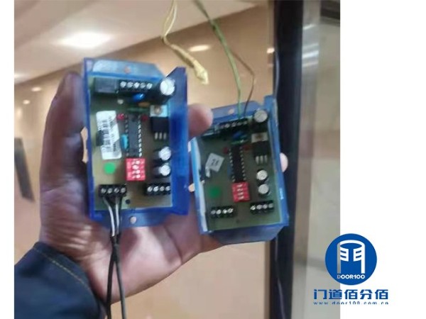 办公楼玻璃自动移门防夹保护装置更换维修